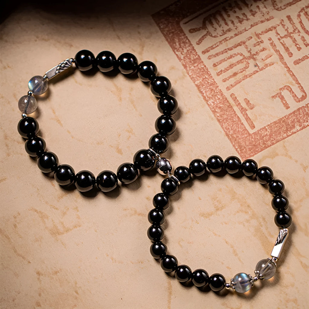Obsidian Buddha beads couple bracelet DIY kit showing 8mm and 10mm beads with stringing materials