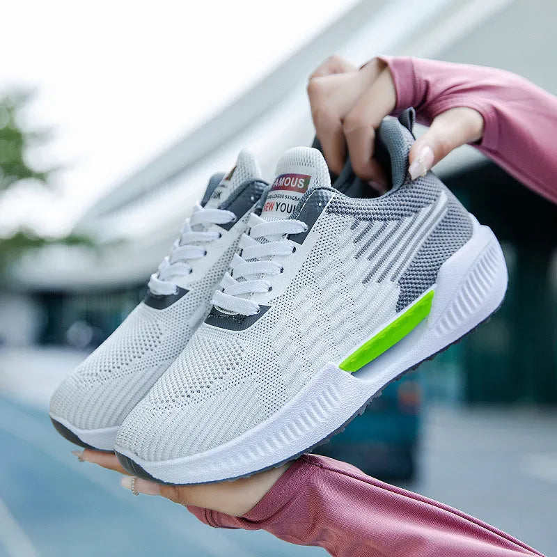 Men's blue breathable mesh casual shoes with round toe and plastic sole on a white background.
