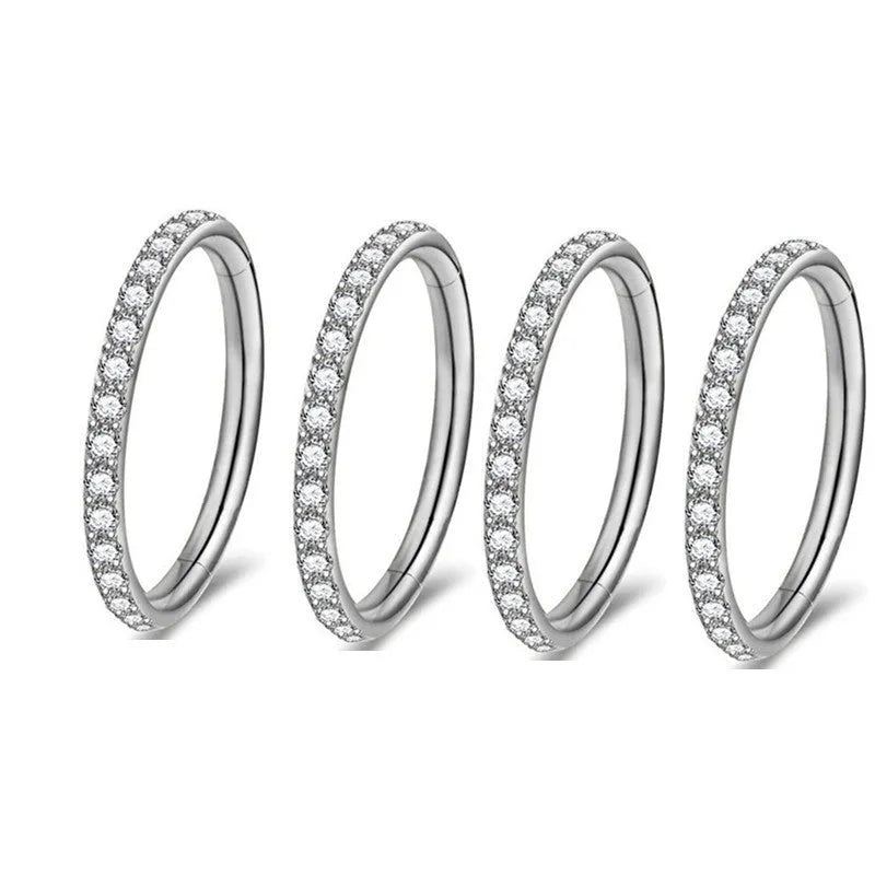 Stainless steel seamless nose ring with diamond detail showing round shape and colour finish options