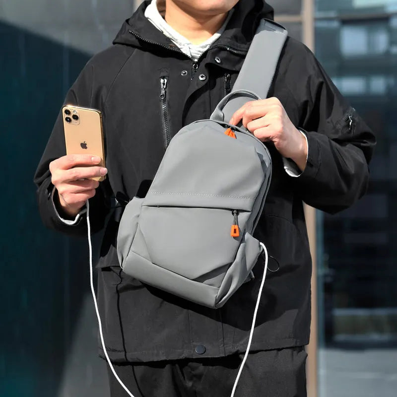 Men's black polyester crossbody bag with simple design and waterproof features