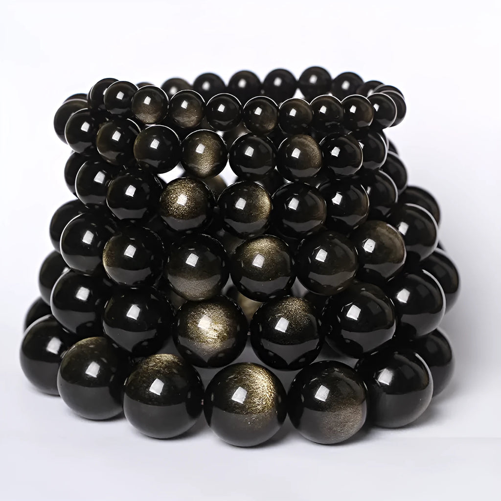 Hand-woven obsidian couple bracelets showing six crystal colour variations with round beads in ethnic style design