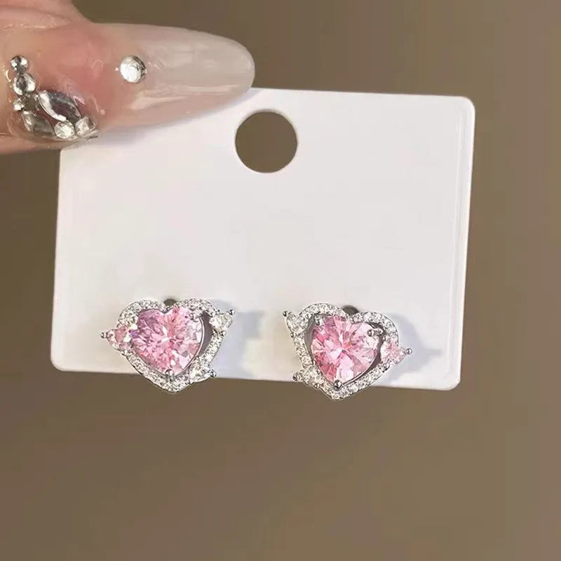 Guardian Heart white K gold tone electroplated copper stud earrings with heart shape design