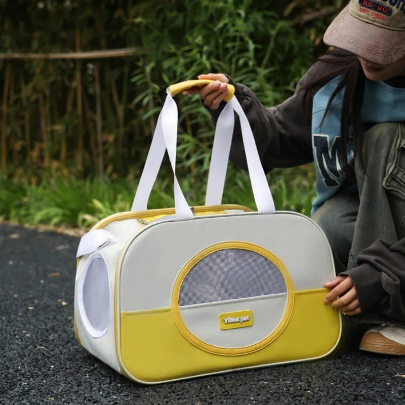 Blue outdoor portable foldable cat backpack with mesh panels, shown with a cat inside.