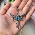 Alloy devil wings cross pendant necklace in geometric design on a chain.