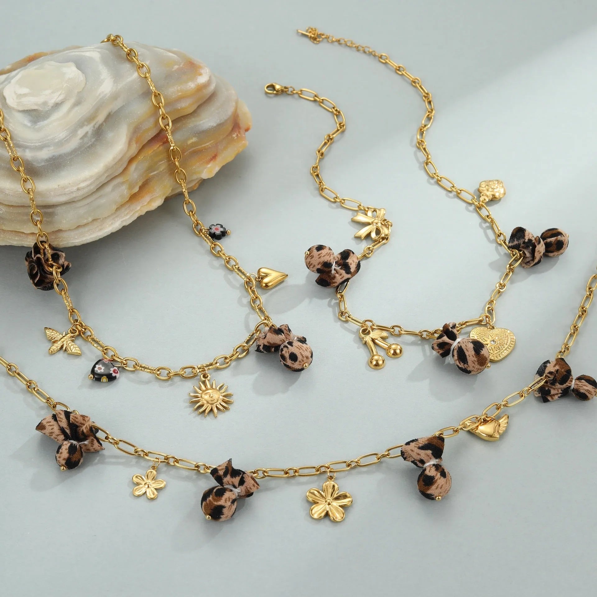 Leopard pattern pendant necklace with love heart and flowers design on stainless steel chain