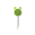 Self-cleaning cat grooming comb with stainless steel teeth in greenish white colour