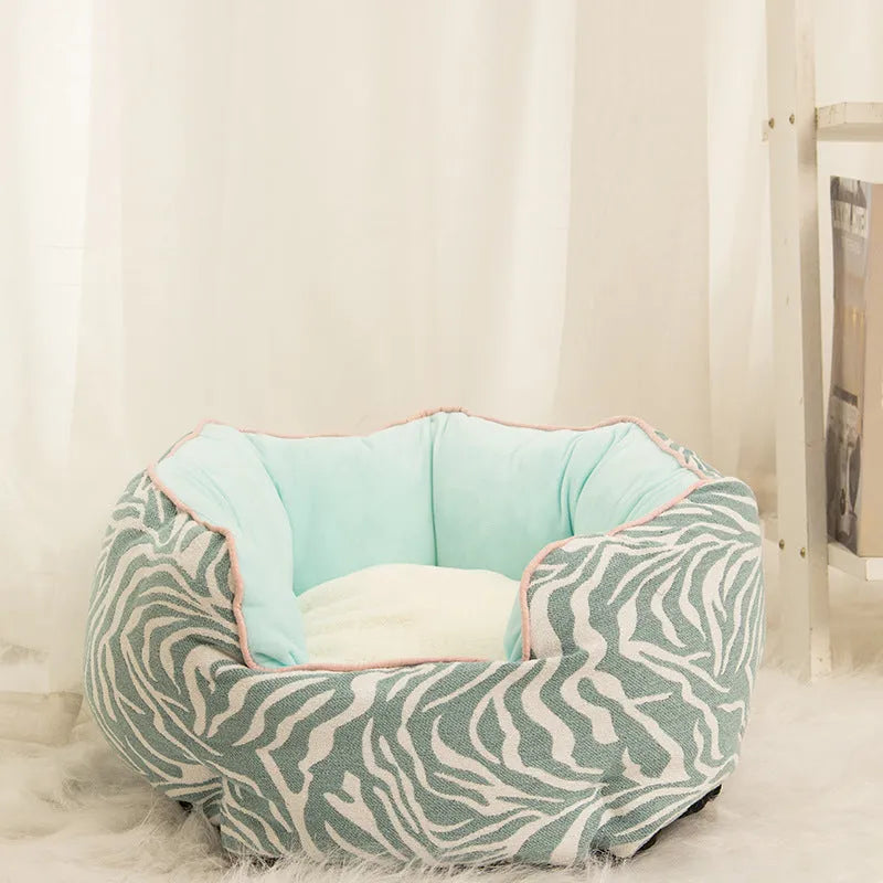 Blue octagonal pet bed with raised sides and removable mats for cats and small dogs