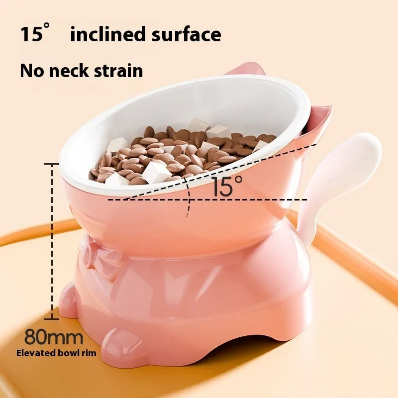 Stainless steel slanted anti-fall cat bowl in yellow on a non-slip base.