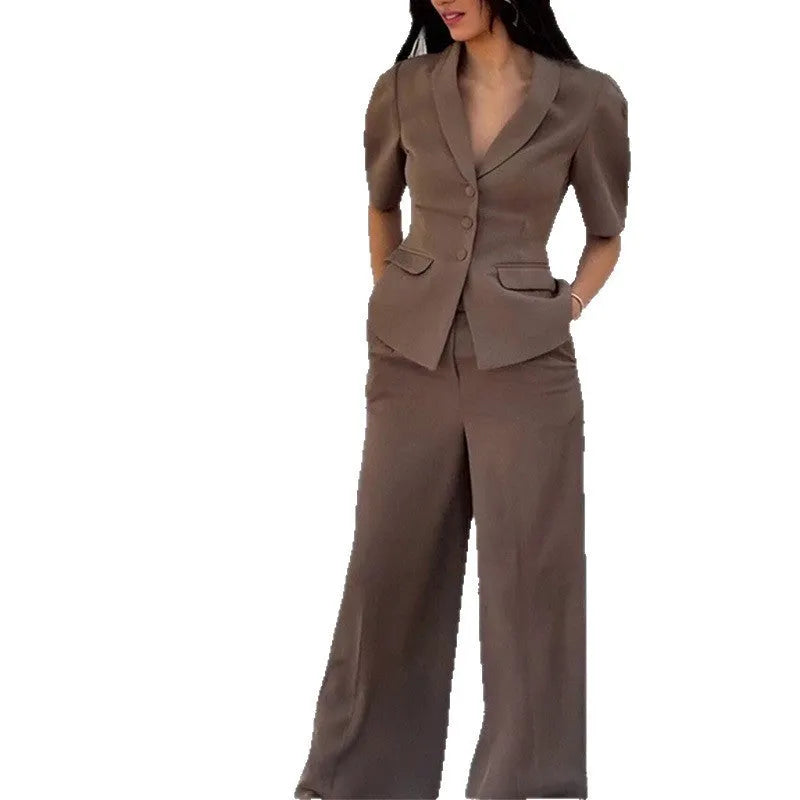 Brown men's slim fit polyester suit with long sleeves and trousers on a hanger