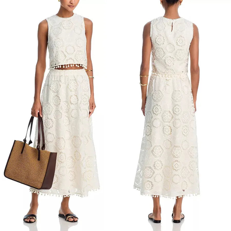 White women's retro art suit with sleeveless top and long skirt featuring embroidery details