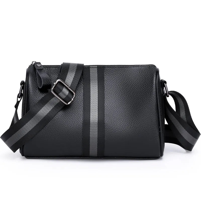 Black genuine leather women's crossbody bag showing front view and shoulder strap