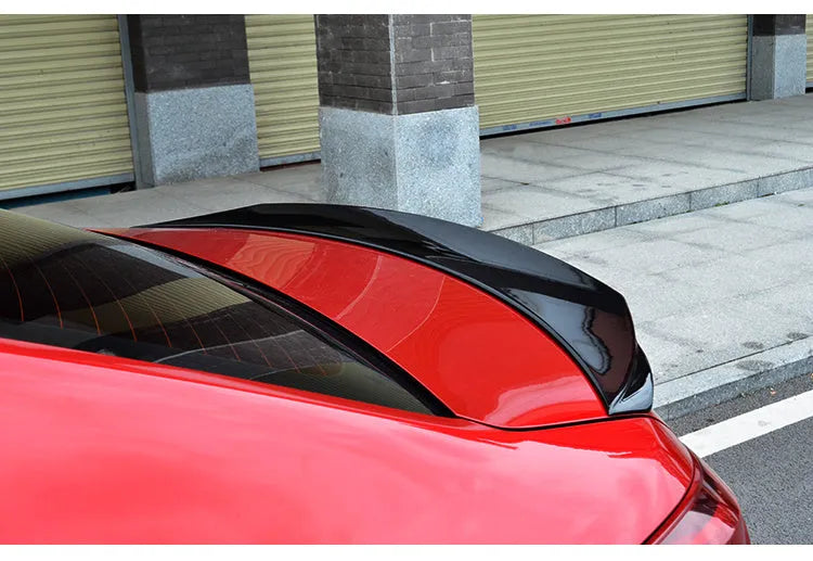 Bright black sports tail blade trim for Mazda 3 Axela Exela with fixed wind surround design