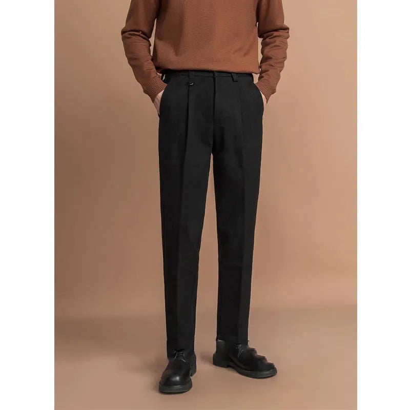 Men's straight-leg trousers in khaki colour on a hanger