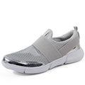 Women's low-top casual sneakers in a colour-block design with a breathable mesh interior.