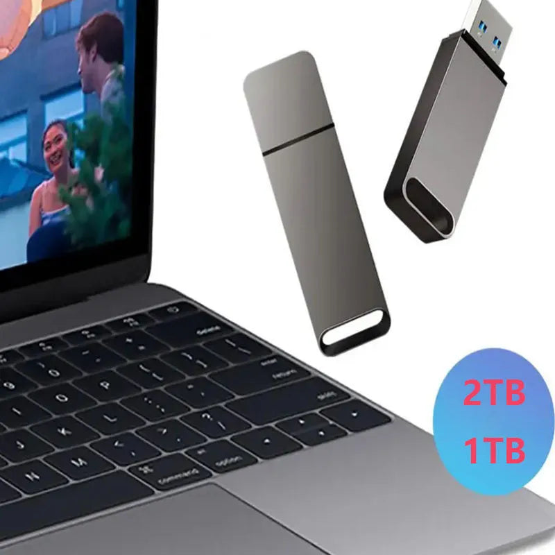 Customisable metal USB flash drive in black, red, or silver colours showing high storage capacity options