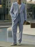 Blue and white striped men's suit set with polyester blazer and trousers on hanger
