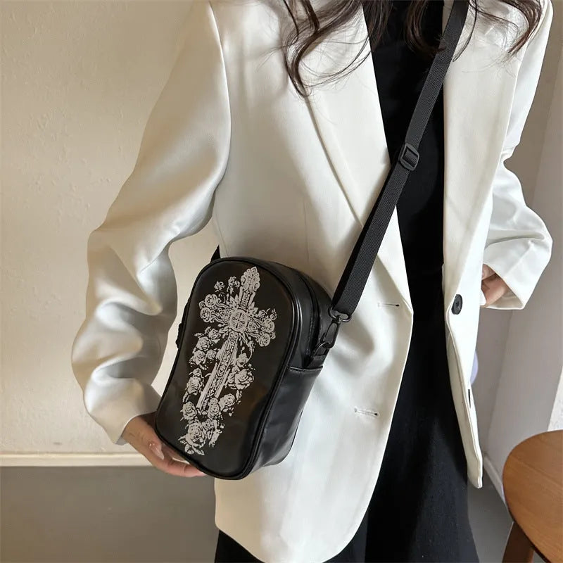 Halloween graffiti print crossbody bag with pumpkin ghost bat designs in black colour
