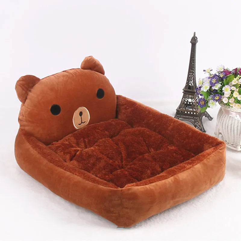 Blue cartoon-style soft plush pet bed sofa for a small dog, with raised sides.
