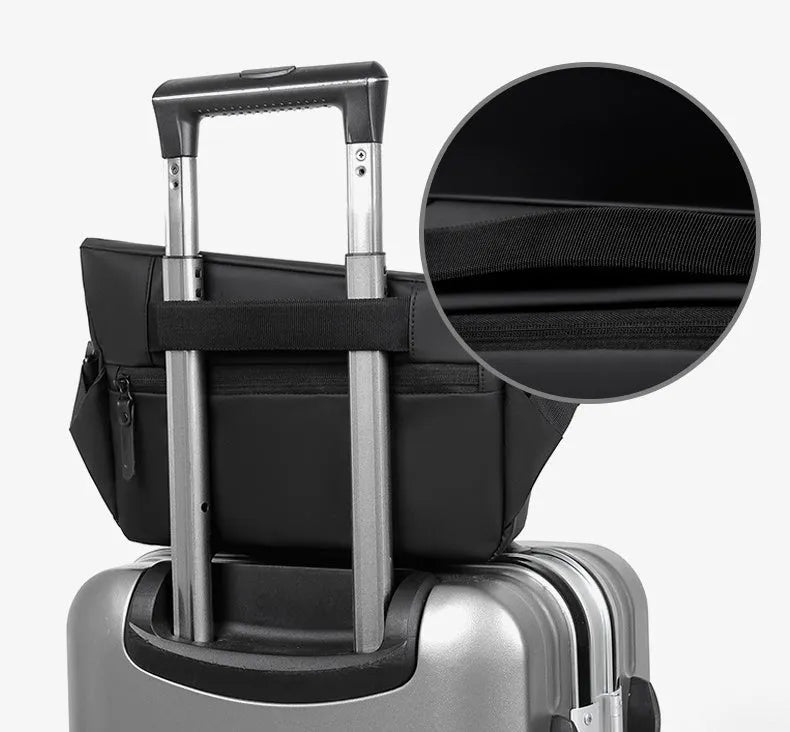 Grey medium crossbody bag with zipper opening showing internal phone and document compartments