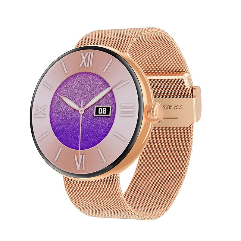 Circular women's smartwatch with metal strap and colour touchscreen display on a wrist.