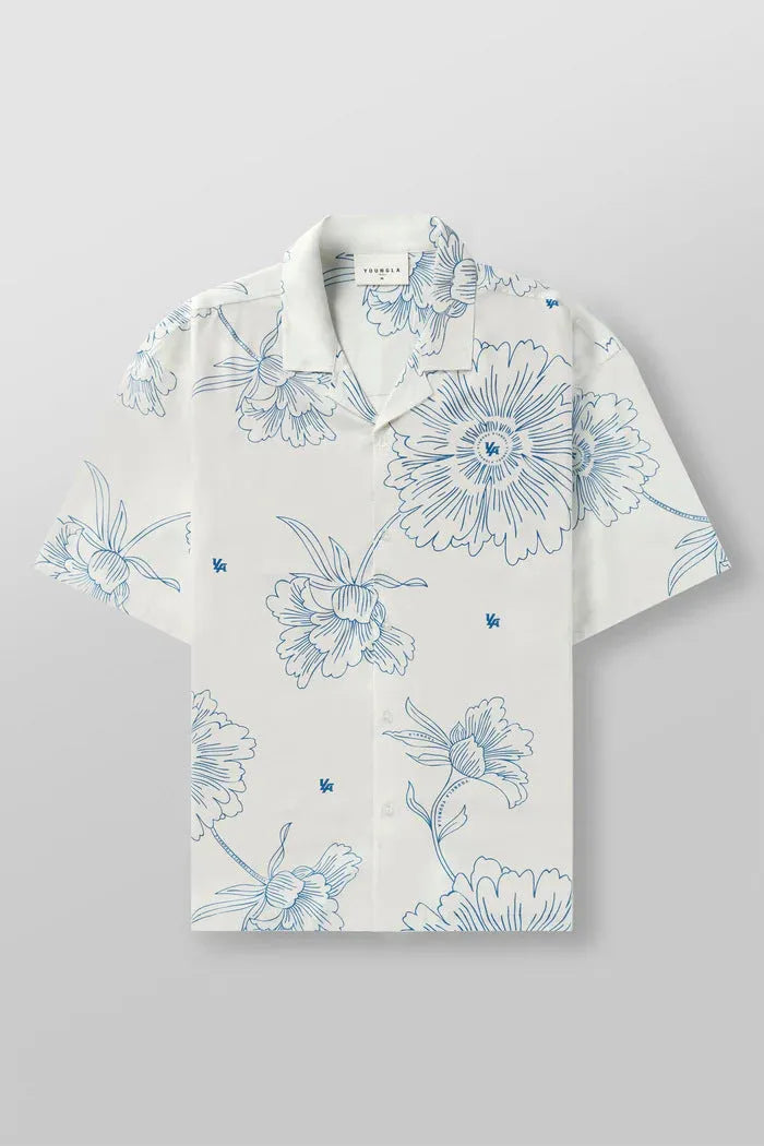 A man's loose-fitting, short-sleeve casual top with a floral print, shown in a neutral colour.