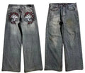 Grey washed-out men's wide-leg straight jeans with a mid-waist and zipper fly.