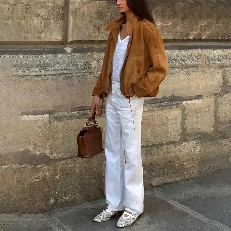 Retro solid colour loose-fit long sleeve polyester jacket on a hanger.