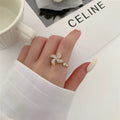 Geometric rotating ring with micro inlaid details in gold or silver electroplated finish