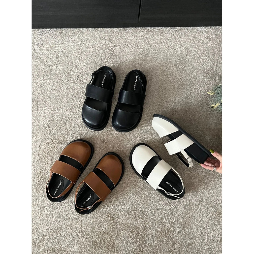 Retro raised bottom sandals with closed toe and ankle strap buckle in apricot colour