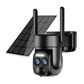 Solar panel mounted on a security camera with zoom lens for outdoor surveillance