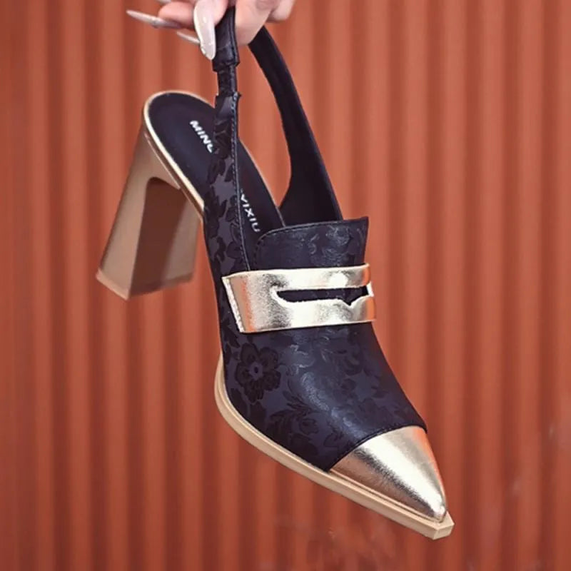 Women's black chunky heel high-cut sandals with pointed toe and elastic ankle strap.