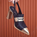 Women's black chunky heel high-cut sandals with pointed toe and elastic ankle strap.