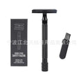 Old-fashioned manual metal shaving scraper and brush set in black and silver finishes