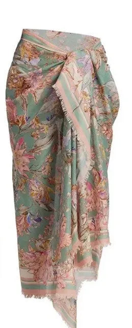 Women's creamy-white floral bikini set with removable skirt on size label
