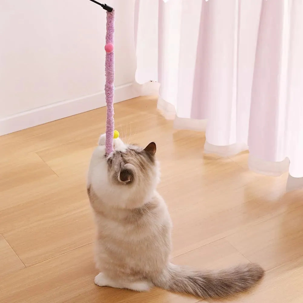 Interactive cat wand toy with a long blue plush strip, fluffy ball, and bells on a stick.