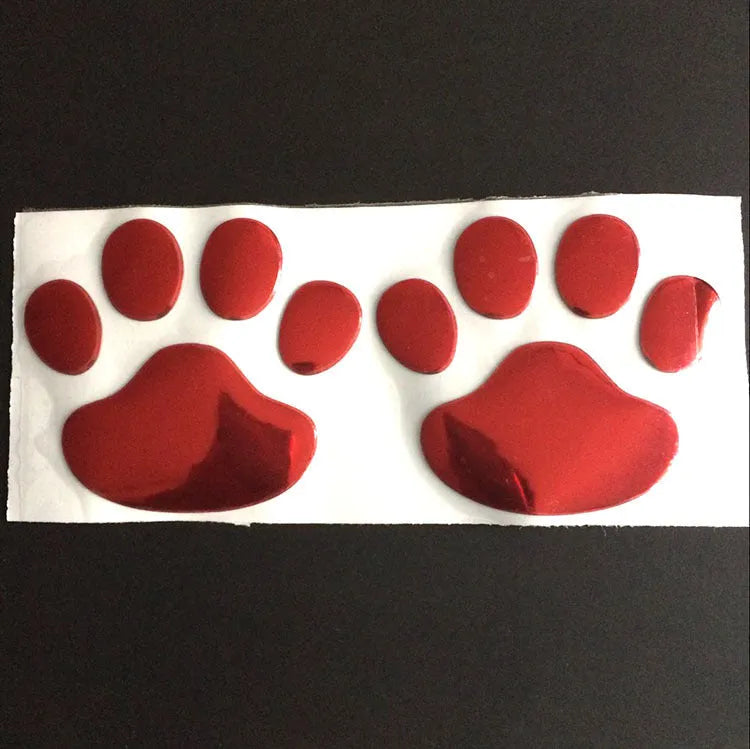 Hand-shaped brush dog footprint car sticker in red, silver, gold, and black colour options.