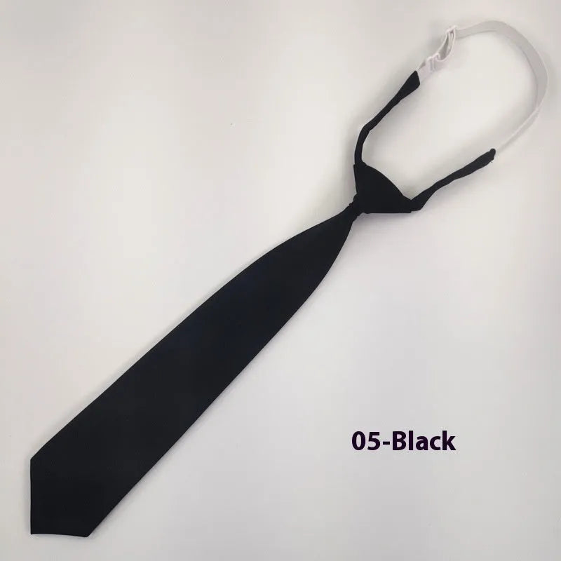 Men's solid colour cotton bow tie in arrow style, shown in navy blue.