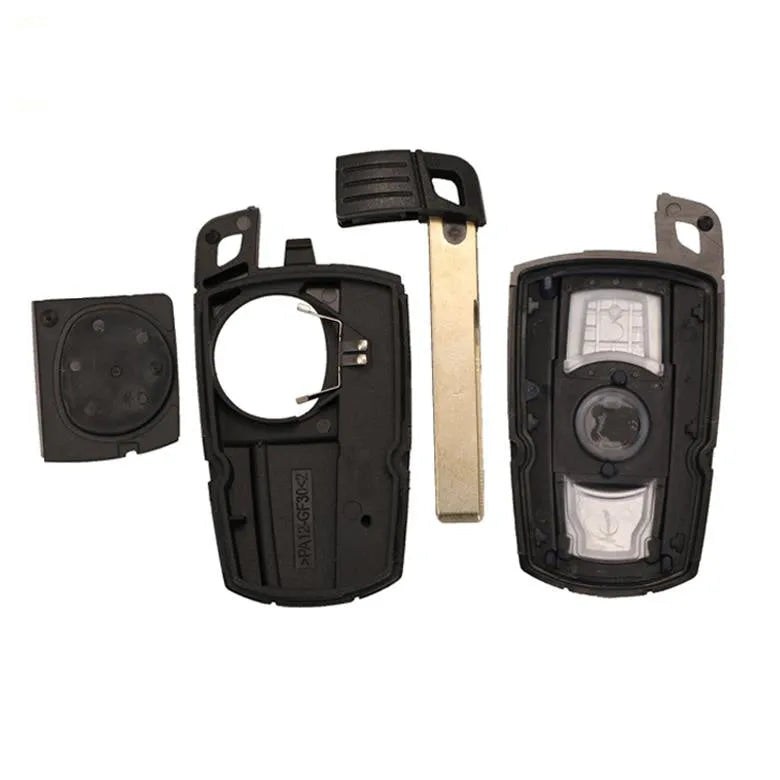 BMW CAS3 semi-intelligent remote car key fob with three blank copper keys.