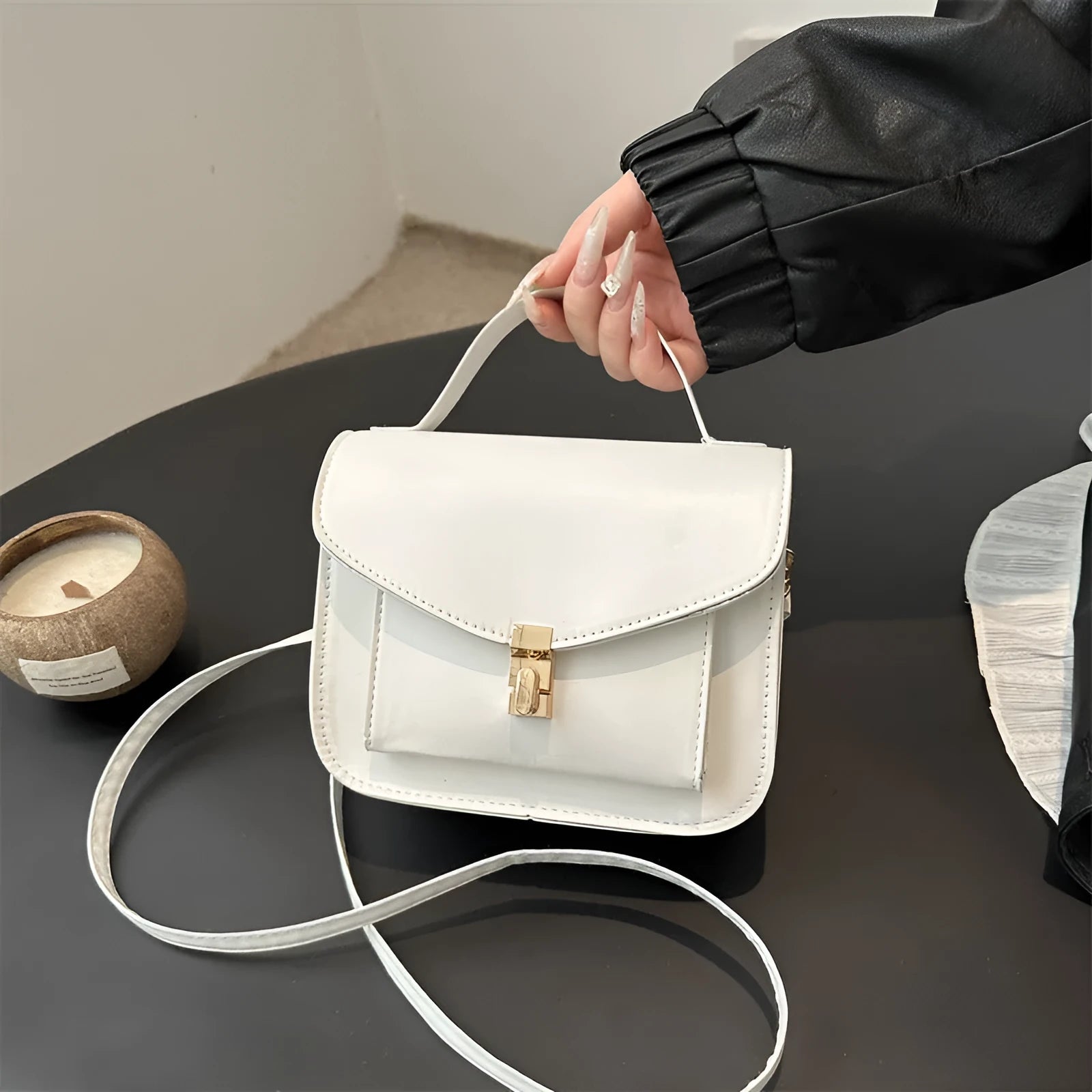 PU leather messenger bag in horizontal square shape with crossbody strap and document compartment