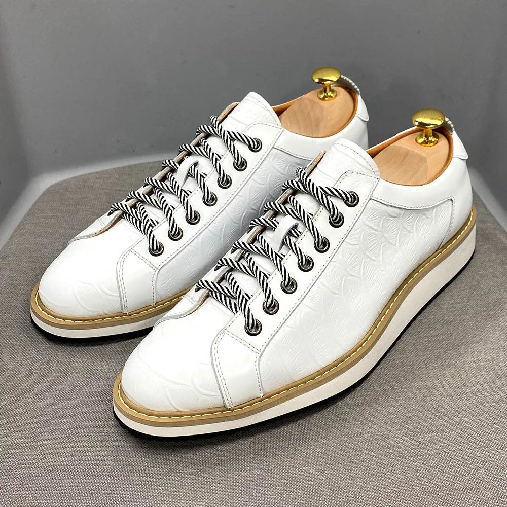 Men's handmade black leather shoes with embossed pattern, low tube height, and front lace-up fastening.