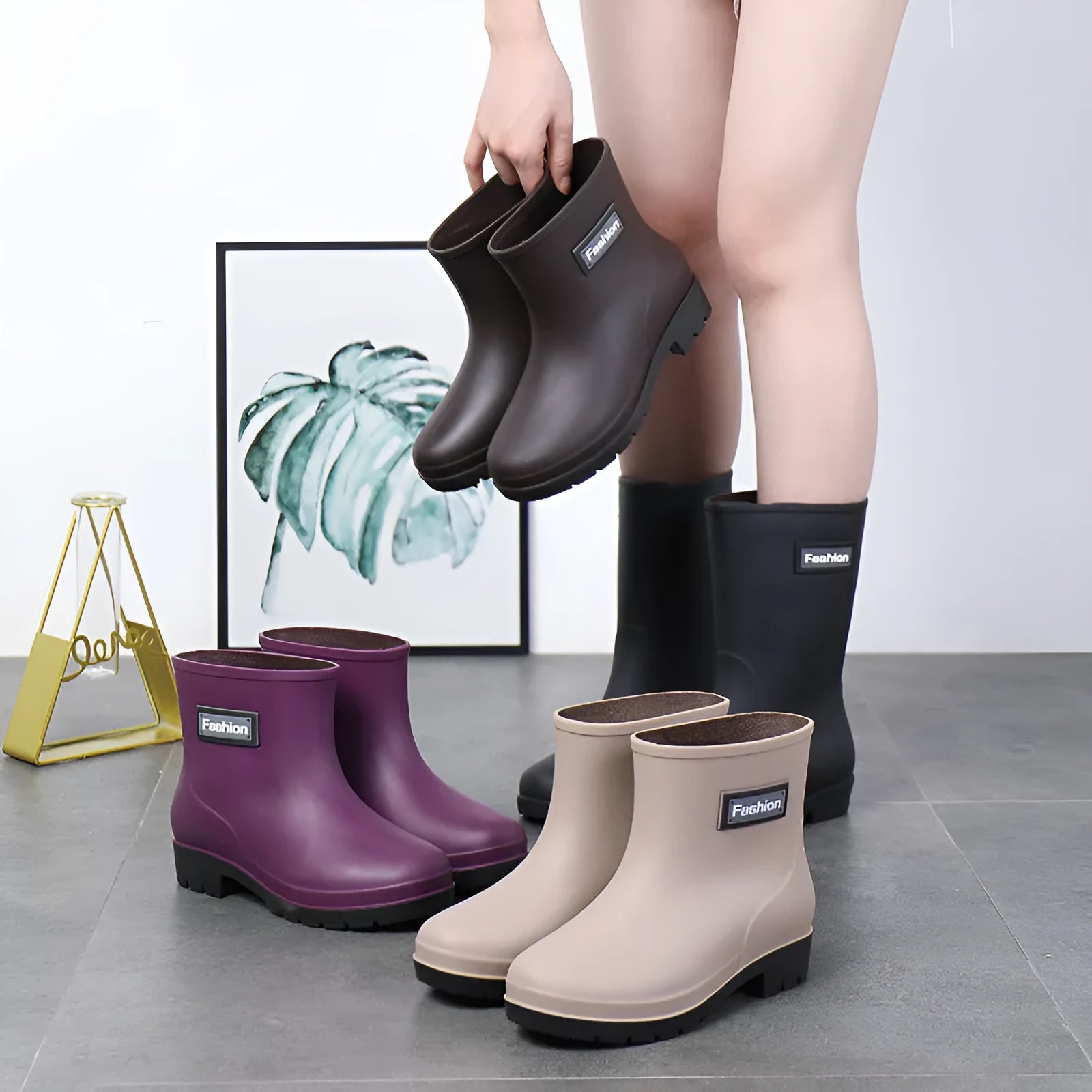 Women's mid-calf PVC rain boots in black with low heel for waterproof work footwear