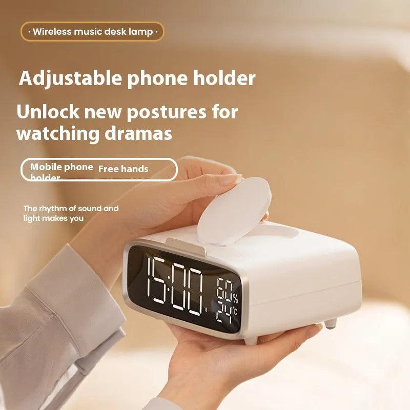Compact white ABS acrylic 3-in-1 unit combining a Bluetooth speaker, wireless charger, and night light.