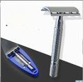 Double-edged safety razor with butterfly-opening head and chrome-plated handle in storage box