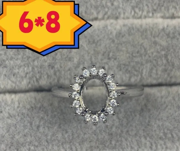 Oval denier ring with open mouth design, 6x8mm main stone and five-pointed star decoration