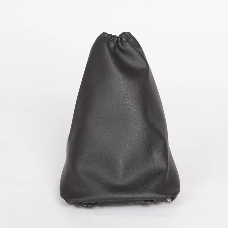 Black leather dust cover for a Toyota Corolla gear shift lever, showing dimensions.