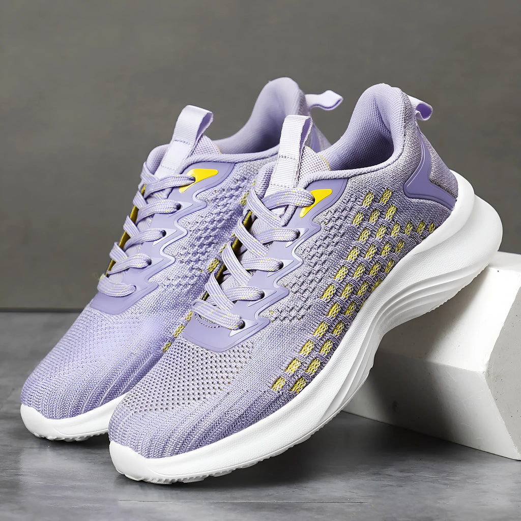Women's Lavender Purple Flyknit running shoes with striped pattern and mesh upper on EVA sole.