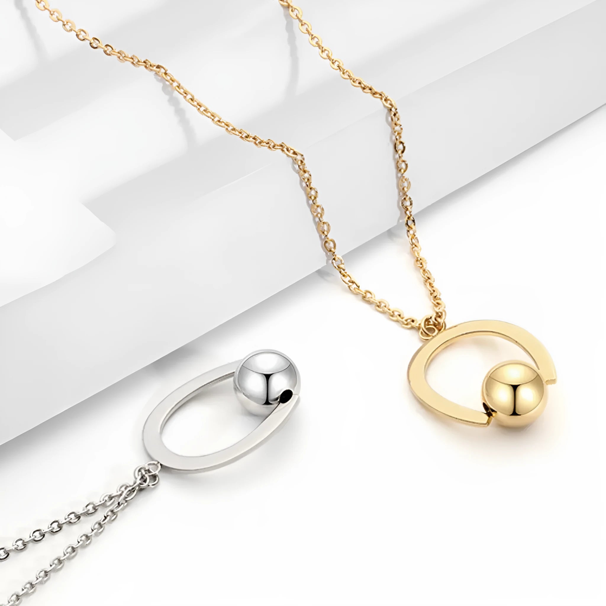 Stainless steel necklace with geometric pendant on adjustable bead chain