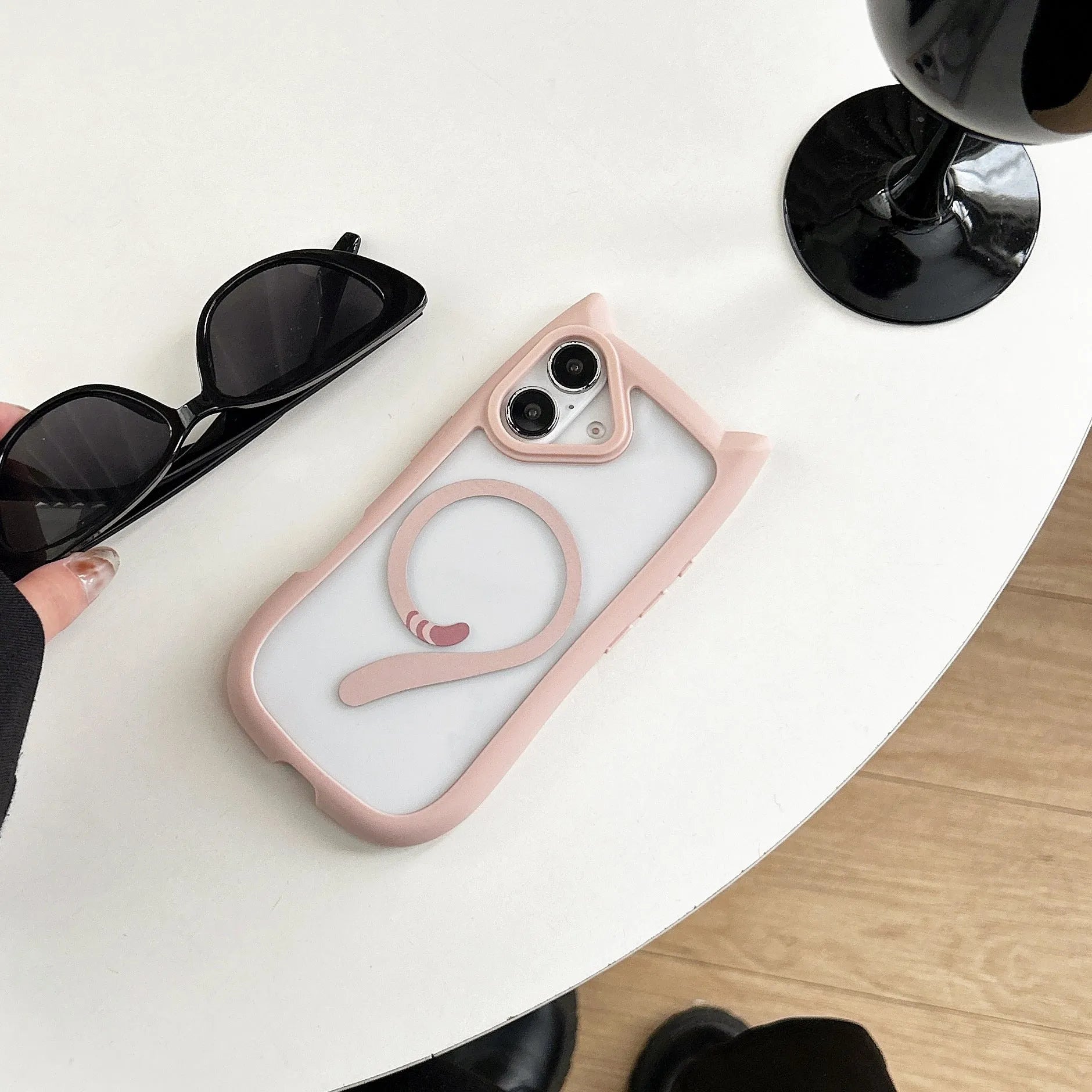 Transparent acrylic and TPU phone case with magnetic suction for IPhone 17 Pro Max in black and pink