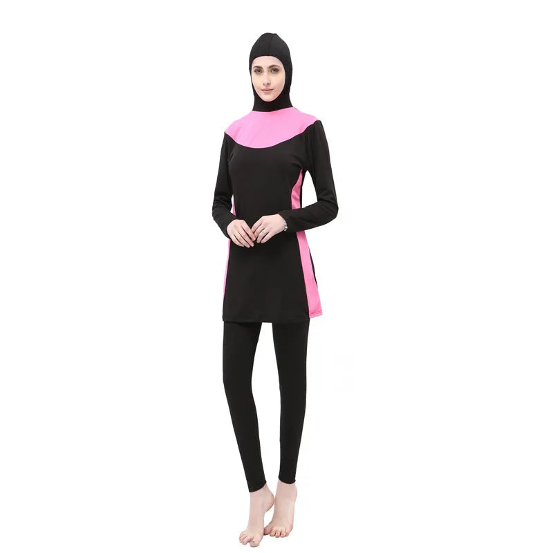Conservative women's swimsuit with long sleeves and hood in black with coloured accents