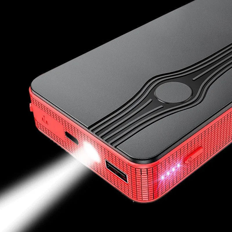 Red K4-E automotive emergency jump starter and power bank unit with USB cable